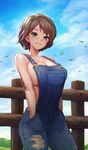  blue_eyes blush breasts brown_hair commentary denim grin hands_in_pockets highres large_breasts looking_at_viewer mole mole_under_eye naked_overalls original overalls parted_lips potato_(sksnabi) seductive_smile short_hair sideboob smile solo torn_clothes 