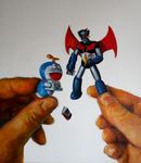  doraemon doraemon_(character) falling hands mazinger_z mazinger_z_(mecha) mecha oil_painting_(medium) older otaku photorealistic playing scan shutendogi super_robot toy traditional_media 