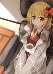  bangs black_ribbon black_vest blanket blonde_hair blush bow commentary couch cup hair_bow hair_ribbon holding holding_cup looking_at_viewer necktie red_bow red_eyes red_neckwear ribbon rumia short_hair sitting solo touhou vest yuuhagi_(amaretto-no-natsu) 