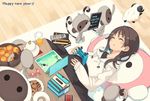  2016 book bowl box brown_hair candy closed_eyes controller cookie eyebrows_visible_through_hair food fruit game_controller glass highres hood hoodie japan_post_service kagami_mochi kotatsu long_hair lying mk_(masatusaboten) monkey new_year on_back orange orange_juice parted_lips pillow plate remote_control rug sheep sleeping solo table tablet wrapped_candy 