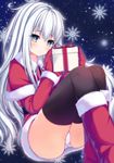  alternate_costume bangs black_legwear blue_eyes boots capelet christmas eyebrows_visible_through_hair fur-trimmed_boots fur-trimmed_sleeves fur_trim gift hibiki_(kantai_collection) highres holding holding_gift kantai_collection long_hair mittens panties pantyshot pantyshot_(sitting) qunqing santa_costume silver_hair sitting snow snowflakes solo thighhighs thighs underwear verniy_(kantai_collection) white_panties 