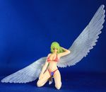  1girl bikini breasts female figure green_hair large_breasts long_hair monet_(one_piece) one_piece photo smile swimsuit wings 