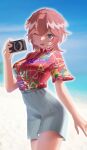  1girl :d absurdres alternate_costume aragiken beach bird_wings blue_eyes blue_sky blurry blurry_background breasts camera contrapposto copyright_name floral_print hawaiian_shirt head_wings highres holding holding_camera hololive medium_breasts official_alternate_costume one_eye_closed open_mouth pink_hair red_shirt sand shirt shorts sky smile summer takane_lui white_hair white_shorts wings 