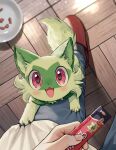  1other animal_ear_fluff blush cat claws commentary_request fangs food from_above green_fur highres holding holding_food kaminokefusa open_mouth pet_food pokemon pokemon_(creature) red_eyes sprigatito tail 