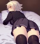  1girl 846-gou absurdres ahoge blush breasts fate/grand_order fate_(series) grey_hair highres jeanne_d&#039;arc_alter_(avenger)_(fate) jeanne_d&#039;arc_alter_(fate) large_breasts long_sleeves looking_at_viewer lying on_bed on_stomach pillow school_uniform short_hair skirt solo yellow_eyes 