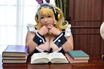  1girl asian blonde_hair breasts brown_eyes cleavage cosplay fat headphones hoshima_mika huge_breasts jewelry necklace nitroplus photo solo star super_pochaco super_pochaco_(cosplay) twintails 