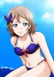  1girl bikini blue_eyes breasts brown_hair cleavage hair_ornament love_live! love_live!_sunshine!! navel saeko_doyle short_hair simple_background sitting solo swimsuit thighs watanabe_you 