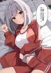  1girl absurdres blush breasts grey_hair gym_uniform highres jacket large_breasts long_sleeves looking_at_viewer lying navel original red_eyes short_hair shorts solo speech_bubble suiroh_(shideoukami) thighs track_jacket translation_request 