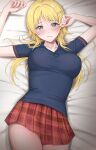  1girl amyu_(amm_asl_pa) arms_up bed_sheet black_shirt blonde_hair blue_eyes blush breasts closed_mouth hachimiya_meguru hair_ornament hairclip highres idolmaster idolmaster_shiny_colors large_breasts long_hair looking_at_viewer low_twintails lying miniskirt on_back plaid_clothes plaid_skirt pleated_skirt red_skirt shirt skirt solo twintails 