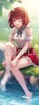  1girl adjusting_sock atelier_(series) atelier_resleriana atelier_resleriana:_the_red_alchemist_&amp;_the_white_guardian atelier_sophie grass highres official_art on_grass one_eye_closed open_mouth red_hair red_skirt sample_watermark shirt skirt smile socks sophie_neuenmuller water watermark white_shirt white_socks 