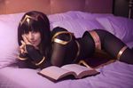  1girl bed black_hair bodystocking book cosplay fire_emblem hair_ornament katyuska_moonfox long_hair looking_at_viewer lying nail_polish pantyhose photo reading tagme tharja 