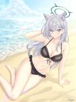  1girl absurdres animal_ears bare_shoulders beach bikini black_bikini black_halo blue_archive blue_eyes blush breasts cleavage collarbone commentary_request extra_ears grey_hair groin hair_between_eyes halo heterochromia highres hisnameissky long_hair looking_at_viewer medium_breasts navel outdoors shiroko_terror_(blue_archive) sitting solo swimsuit thighs wolf_ears 