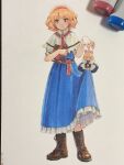  1girl alice_margatroid art_tools_in_frame blonde_hair blue_dress blush book boots brown_boots capelet closed_mouth commentary_request doll dress frilled_dress frills full_body grimoire grimoire_of_alice hairband highres holding holding_book jewelry lace-up_boots looking_at_viewer photo_(medium) puppet_rings red_hairband red_sash ring sash shanghai_doll shiratama_(hockey) short_hair smile solo touhou traditional_media waist_sash white_capelet yellow_eyes 