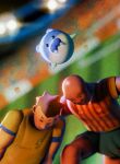  3d bald blender_(medium) blurry blurry_background commentary dark-skinned_male dark_skin english_commentary highres louie_zong pokemon pokemon_(creature) seal_(animal) soccer soccer_stadium soccer_uniform spheal spiked_hair sportswear squinting thick_eyebrows tusks 