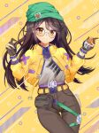  1girl absurdres beanie belt blush brown_gloves brown_hair brown_pants closed_mouth commentary english_commentary eyelashes glasses gloves green_hat grey_shirt hat highres holding inkyubee jacket killjoy_(valorant) long_hair long_sleeves open_clothes open_jacket orange_eyes pants partially_fingerless_gloves pouch round_eyewear shirt smile solo twitter_username valorant yellow_background yellow_belt yellow_jacket 