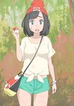  bag bangs beanie black_hair blue_eyes cowboy_shot green_shorts handbag hat highres holding holding_poke_ball looking_at_viewer mizuki_(pokemon) open_mouth outdoors poke_ball poke_ball_(generic) pokemon pokemon_(game) pokemon_sm red_hat shirt shishi_toogarashi short_hair short_shorts shorts solo sweatdrop swept_bangs tied_shirt 