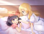  ;o bangs bed bed_sheet bedroom black_hair blonde_hair blue_eyes blue_ribbon blunt_bangs blush bow box_of_chocolates braid chocolate eye_contact eyebrows_visible_through_hair feeding hair_bow hair_ribbon half-closed_eyes indoors light_rays lillie_(pokemon) long_hair looking_at_another lying mizuki_(pokemon) multiple_girls one_eye_closed open_mouth pajamas pillow pokemon pokemon_(game) pokemon_sm polka_dot_pajamas red_ribbon ribbon ringo_(nanaprin) short_hair short_sleeves sitting smile tissue_box valentine yuri 