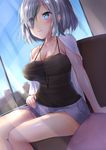  alternate_costume arm_support blue_eyes blush breasts cleavage commentary_request eyebrows_visible_through_hair eyes_visible_through_hair hair_over_one_eye hamakaze_(kantai_collection) highres ichinose_kizuki indoors kantai_collection large_breasts see-through short_hair shorts silver_hair sitting solo thighs 
