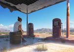  ankle_boots blue_sky boots brown_hair building cloud day desert from_behind gas_pump grass hair_bun looking_afar mountain natsu_(hottopeppa3390) original scenery shade shirt short_hair shorts sign sitting sky solo t-shirt tire 