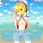  1girl ahoge bare_shoulders beach blonde_hair breasts fate/extra fate_(series) flower green_eyes navel one_eye_closed saber_extra sea swimsuit v veil wink 