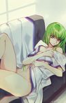  bangs breasts c.c. code_geass commentary_request couch creayus green_hair long_hair looking_at_viewer lying navel nude on_back sidelocks small_breasts solo yellow_eyes 