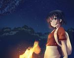  backpack bag bangs black_cerulean_(kemono_friends) black_hair bonkiru brown_eyes closed_mouth commentary fire from_side highres kaban_(kemono_friends) kemono_friends looking_at_viewer night outdoors red_shirt shirt short_hair solo spoilers torch upper_body wavy_hair 