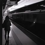  greyscale ground_vehicle ilya_kuvshinov monochrome original railroad_tracks short_hair solo train train_station 