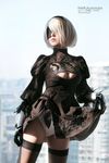  1girl asian back blindfold breasts cleavage_cutout cosplay dress dress_lift gloves hairband highleg_leotard highres japanese leotard lips looking_at_viewer mole_under_mouth nier_(series) nier_automata short_hair solo thighhighs under_dress white_hair yorha_no._2_type_b 