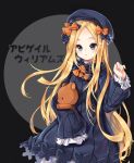  1girl abigail_williams_(fate/grand_order) alternate_eye_color bangs beret black_bow black_dress black_hat blonde_hair bloomers blush bow bug butterfly character_name commentary_request dress eyebrows_visible_through_hair fate/grand_order fate_(series) fingernails forehead green_eyes grey_background hair_bow hand_up hat insect long_hair long_sleeves looking_at_viewer object_hug orange_bow parted_bangs parted_lips polka_dot polka_dot_bow sleeves_past_fingers sleeves_past_wrists solo sonabi_(misty_alice) stuffed_animal stuffed_toy teddy_bear two-tone_background underwear very_long_hair white_bloomers 