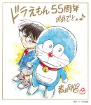  1boy aoyama_goushou artist_name bell black-framed_eyewear black_hair blue_eyes blue_jacket border bow bowtie closed_mouth copyright_notice crossover doraemon doraemon_(character) dutch_angle edogawa_conan from_above full_body glasses grey_shorts hands_in_pockets happy_anniversary jacket long_sleeves looking_at_viewer looking_to_the_side meitantei_conan musical_note neck_bell official_art quarter_note red_bow red_bowtie red_shoes shoes short_hair shorts signature smile standing 