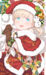  1girl alternate_costume blonde_hair blue_eyes blunt_bangs brown_gloves capelet christmas fur-trimmed_capelet fur-trimmed_headwear fur_trim gift gloves hat hayashi_naoharu highres holding holding_sack kantai_collection long_hair open_mouth red_capelet red_headwear round_teeth sack santa_costume santa_hat shin&#039;you_(kancolle) side_ponytail solo teeth textless_version upper_teeth_only 