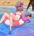  1girl absurdres and-j_(dlwjdqja1212) beach bikini blonde_hair blue_eyes food hair_ribbon highres ice_cream innertube kantai_collection long_hair looking_to_the_side navel no_shoes off_shoulder open_mouth ribbon ro-500_(kancolle) smile solo swim_ring swimsuit teeth tongue upper_teeth_only white_bikini 