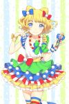  1girl blonde_hair blue_eyes blunt_bangs bow commentary_request cone_hair_bun cowboy_shot double_bun dress finger_to_cheek green_bow hair_bow hair_bun hands_up holding holding_microphone idol_clothes jewelry looking_at_viewer microphone minami_mirei multicolored_clothes multicolored_dress necklace pretty_series pripara red_bow short_hair smile solo sparkle_background standing striped_background striped_clothes striped_thighhighs thighhighs unya_(unya-unya) 