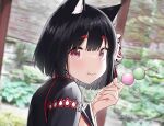  1girl animal_ears azur_lane black_hair black_kimono blush cat_ears cat_girl cat_mask chewing commentary_request cotton_kanzaki dango eating food food_in_mouth from_side hair_between_eyes hand_up highres japanese_clothes kimono long_sleeves looking_at_viewer looking_back mask mask_on_head medium_hair pink_eyes red_eyes solo upper_body wagashi wide_sleeves yamashiro_(azur_lane) 