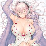  bow breasts cleavage closed_eyes eyebrows_visible_through_hair food_print headphones large_breasts long_hair lying nitroplus on_back open_clothes pink_hair purple_sweater red_bow sleeping smile solo strawberry_print super_sonico sweater tsuji_santa 