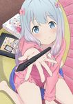  arm_support arm_up barefoot between_legs blue_eyes blush bow eromanga_sensei eyebrows_visible_through_hair from_above fury_(leo) hair_bow hand_between_legs highres holding holding_stylus indoors izumi_sagiri kneehighs long_hair looking_at_viewer official_style pajamas pink_bow pink_shirt pink_shorts shirt short_shorts shorts silver_hair smile solo 