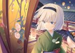  1girl balcony black_hairband blue_eyes blue_sash closed_mouth commentary_request floral_print food fusuma green_kimono grey_hair hairband highres indoors japanese_clothes kimono konpaku_youmu konpaku_youmu_(ghost) lantern night obi obijime paper_lantern qilunuo_yumi revision sash short_hair shouji sky_lantern sliding_doors solo sushi tile_roof touhou turning_head 