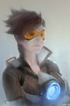  absurdres bomber_jacket brown_eyes brown_hair brown_jacket goggles harness highres jacket leather leather_jacket looking_at_viewer orange_goggles overwatch pu_zhou short_hair simple_background solo spiked_hair tracer_(overwatch) upper_body 