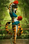  anthro avoid_posting black_hair boxing boxing_gloves clothed clothing feline female forest fur gloves hair mammal mysticsabreonic outside sport striped_fur stripes tiger tree 
