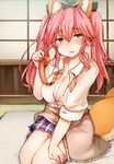  alternate_costume animal_ears bangs blush breasts cleavage clothes_around_waist commentary_request eyebrows_visible_through_hair fate/extella fate/extra fate_(series) fox_ears fox_tail futon gyaru hair_between_eyes hand_up holding indoors kogal large_breasts long_hair looking_at_viewer necktie nose_blush open_clothes open_shirt parted_lips pink_hair pleated_skirt purple_skirt sabujiroko school_uniform shirt sidelocks sitting skirt smile solo sweater_around_waist tail tamamo_(fate)_(all) tamamo_jk_(fate) tatami twintails yellow_eyes 
