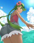  ass dark_skin flower from_behind green_eyes green_hair hair_flower hair_ornament kuro_(be_ok) long_hair looking_at_viewer looking_back mao_(pokemon) ocean open_mouth pokemon pokemon_(game) pokemon_sm solo twintails 