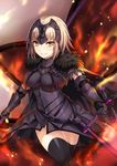  &gt;:) armor bangs black_legwear blonde_hair breasts chain cleavage commentary cowboy_shot eyebrows_visible_through_hair fate/grand_order fate_(series) faulds fire flag gauntlets harimoji headpiece highres holding holding_flag holding_sword holding_weapon jeanne_d'arc_(alter)_(fate) jeanne_d'arc_(fate)_(all) knee_up large_breasts looking_at_viewer parted_lips sheath short_hair sidelocks smile solo standard_bearer sword thighhighs thighs unsheathed v-shaped_eyebrows weapon yellow_eyes 