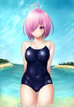  ahoge arena_(company) beach competition_school_swimsuit covered_nipples cowboy_shot day fate/grand_order fate_(series) hair_over_one_eye highres horizon looking_at_viewer marubonman mash_kyrielight one-piece_swimsuit outdoors pink_hair purple_eyes school_swimsuit short_hair smile solo standing swimsuit wading water wet 