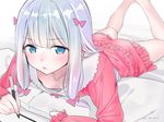  ama_mitsuki ass bangs barefoot blue_eyes blush bow breasts closed_mouth commentary_request downblouse eromanga_sensei eyebrows_visible_through_hair feet_up hair_bow holding izumi_sagiri long_hair looking_at_viewer low-tied_long_hair lying on_bed on_stomach pajamas pink_bow pink_pajamas pink_shorts shiny shiny_hair shorts silver_hair small_breasts solo stylus tablet 