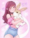  1girl absurdres animal artist_name black_choker brown_eyes brown_hair choker collarbone commentary cowboy_shot d.va_(overwatch) english_commentary facial_mark grin highres holding holding_animal holding_rabbit konomidraws korean_text long_hair looking_at_viewer midriff navel one_eye_closed overwatch parted_lips rabbit shorts smile solo star_(symbol) translation_request whisker_markings 