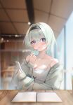  1girl absurdres alternate_costume applying_lipgloss applying_makeup applying_own_makeup bare_shoulders black_hairband blurry blurry_background blush book breasts cafe camisole cardigan cellphone chinese_commentary cleavage collarbone commentary cup doe-foot_applicator drinking_glass drinking_straw firefly_(honkai:_star_rail) green_pupils grey_hair hair_intakes hairband highres holding holding_phone honkai:_star_rail honkai_(series) indoors large_breasts lipgloss long_hair long_sleeves looking_at_viewer multicolored_eyes off_shoulder open_book open_cardigan open_clothes parted_lips phone pink_lips pov_across_table purple_eyes sidelighting smartphone solo spaghetti_strap table two-tone_eyes white_camisole window yawww_(yawwwart) 