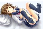  1girl blue_legwear blush brown_eyes brown_hair feet feet_up inazuma_(kantai_collection) kantai_collection looking_at_viewer lying no_shoes pantyshot pillow serafuku socks soles 