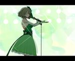  backless_dress backless_outfit bare_shoulders breasts brown_hair commentary_request detached_sleeves dress from_side gloves green green_dress green_eyes green_gloves hair_ribbon holding holding_microphone idolmaster idolmaster_cinderella_girls large_breasts letterboxed looking_away microphone microphone_stand outstretched_arm parted_lips profile ribbon senju_(snz0) short_hair solo spotlight standing takagaki_kaede 