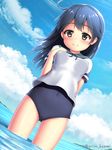  antenna_hair arisu_kazumi artist_name ass_visible_through_thighs black_hair blue_sky blue_swimsuit breasts brown_eyes cloud day hand_on_own_chest highres impossible_clothes island kantai_collection long_hair looking_at_viewer mountain neck_ribbon ocean one-piece_swimsuit ribbon school_uniform serafuku sky small_breasts solo swimsuit swimsuit_under_clothes ushio_(kantai_collection) 