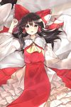  arm_up ascot bad_id bad_twitter_id bangs bed_sheet black_eyes black_hair blush bow brown_hair cheunes detached_sleeves eyebrows_visible_through_hair hair_between_eyes hair_bow hair_tubes hakurei_reimu highres huge_bow long_hair looking_at_viewer lying on_back open_mouth petticoat red_bow red_string sidelocks solo string touhou 